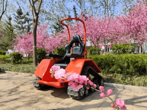 All-Terrain Powered Tracked Wheelchair with Electric Motor