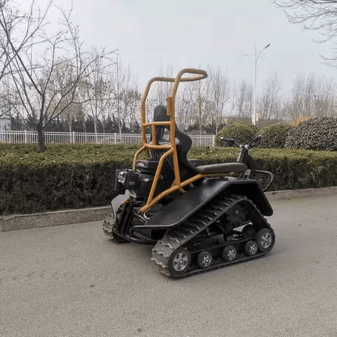 All-Terrain Powered Tracked Wheelchair with Electric Motor
