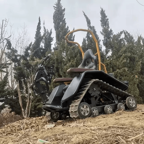 All-Terrain Powered Tracked Wheelchair with Electric Motor